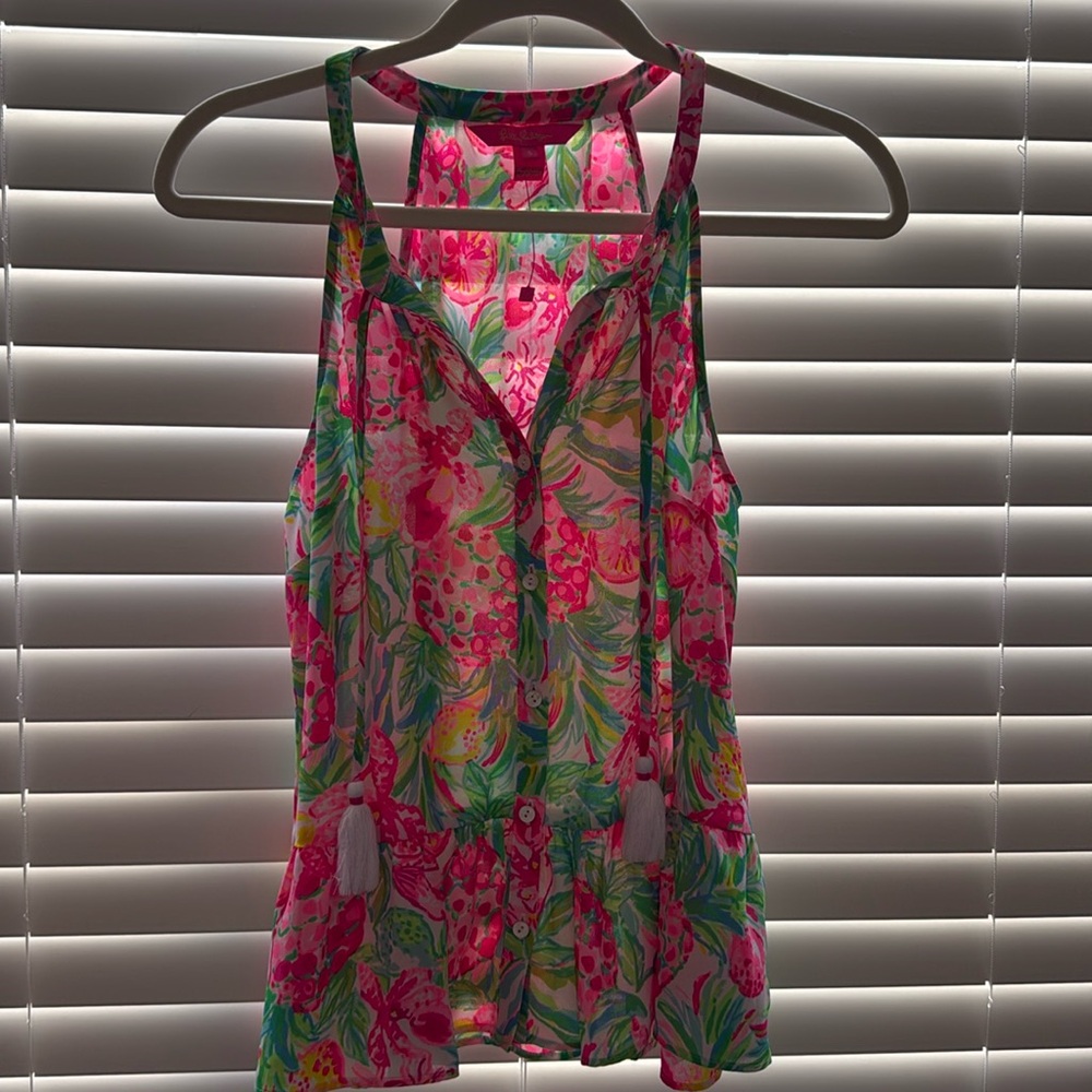 Never worn Lily Pulitzer top! Adorable tassle details and button in front. NWOT